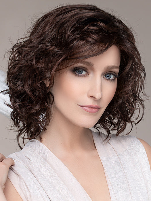 Delicate Plus By Ellen Willie, remy Human Hair Wig. Styled with waves